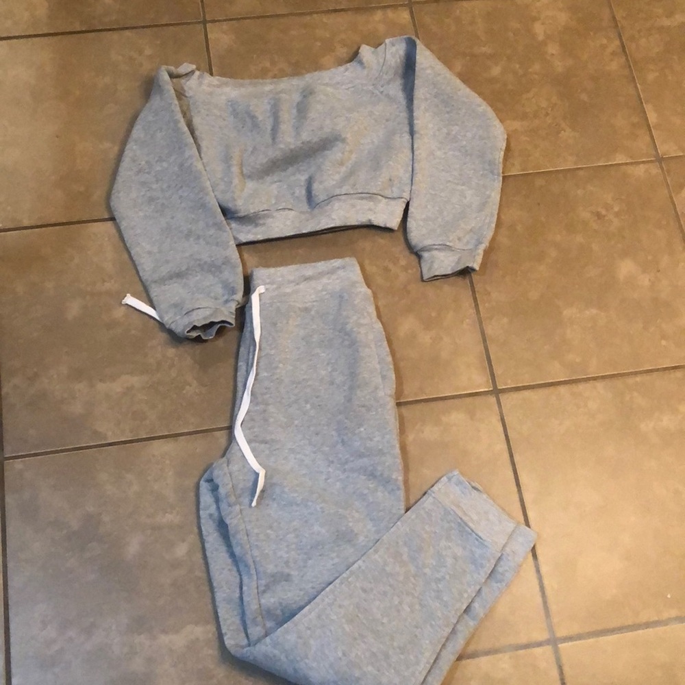 Gray crop top jumpsuit. Not true to size